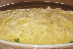 Mamaliguta  cu branza de burduf si oua la cuptor