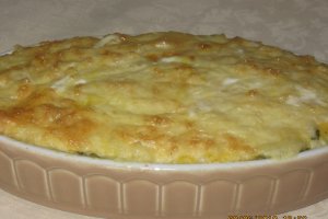 Mamaliguta  cu branza de burduf si oua la cuptor