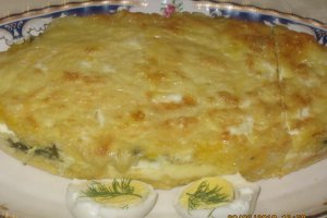 Mamaliguta  cu branza de burduf si oua la cuptor