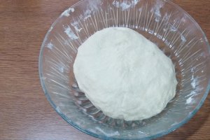 Desert gogosi pufoase umplute cu crema de ciocolata