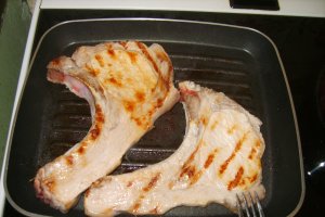 Orez cu ciuperci si friptura de porc