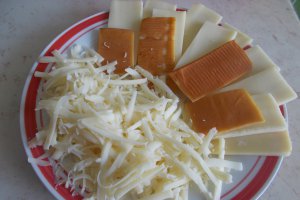 Conopida impanata cu cascaval, la cuptor