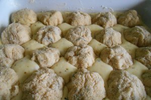 Bulgarasi de cartofi in sos alb, la cuptor