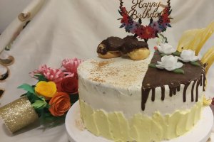 Desert tort profiterol cu ciocolata si portocale